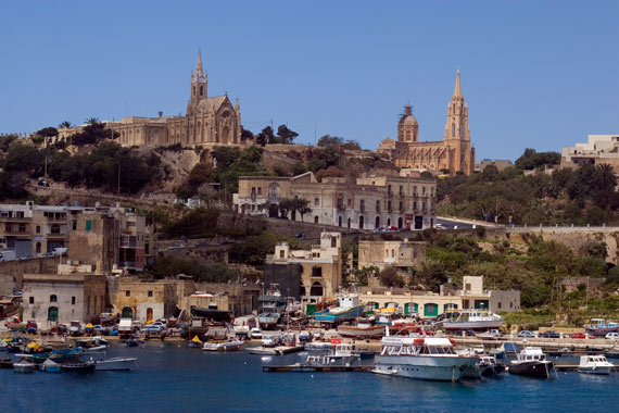 If you had to choose 3 places to visit in Malta, what would they be? Also, is it worth taking a day trip to Gozo if you have only 3 days in which to see as much as possible?” These were the questions we texted to our parents when we arrived in Malta. Both lots put Gozo high on the list of places to visit, so who were we to argue?  We set off early-ish in order to drive across Malta from Manoel Island to the ferry port, giving ourselves plenty of time to see all the sites that I had carefully listed in the back of our newly acquired Lonely Planet guide. Gozo's only a small place, so I reckoned we could pack a lot in, especially with Jamie's recently perfected rally-style driving... We hadn't taken into account, however, the crap road map, the non existence of road signs on Malta and Gozo and the over-crowded roads in the morning rush hour. With somewhat shredded nerves we finally arrived at the ferry, missing it by one minute and having to wait 45 minutes for the next one. Nice start.  