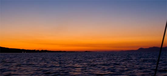 kossun Kos, left, and Turkey, right, ablaze with sunsets and lights